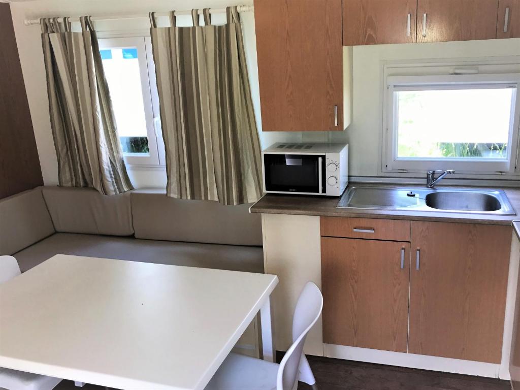 Kuchyň nebo kuchyňský kout v ubytování Camping Pirinenc