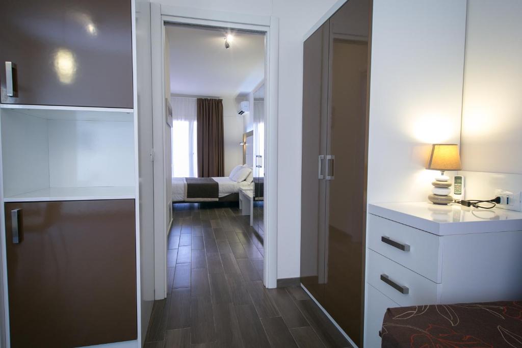 Postel nebo postele na pokoji v ubytování Hotel La Torraccia