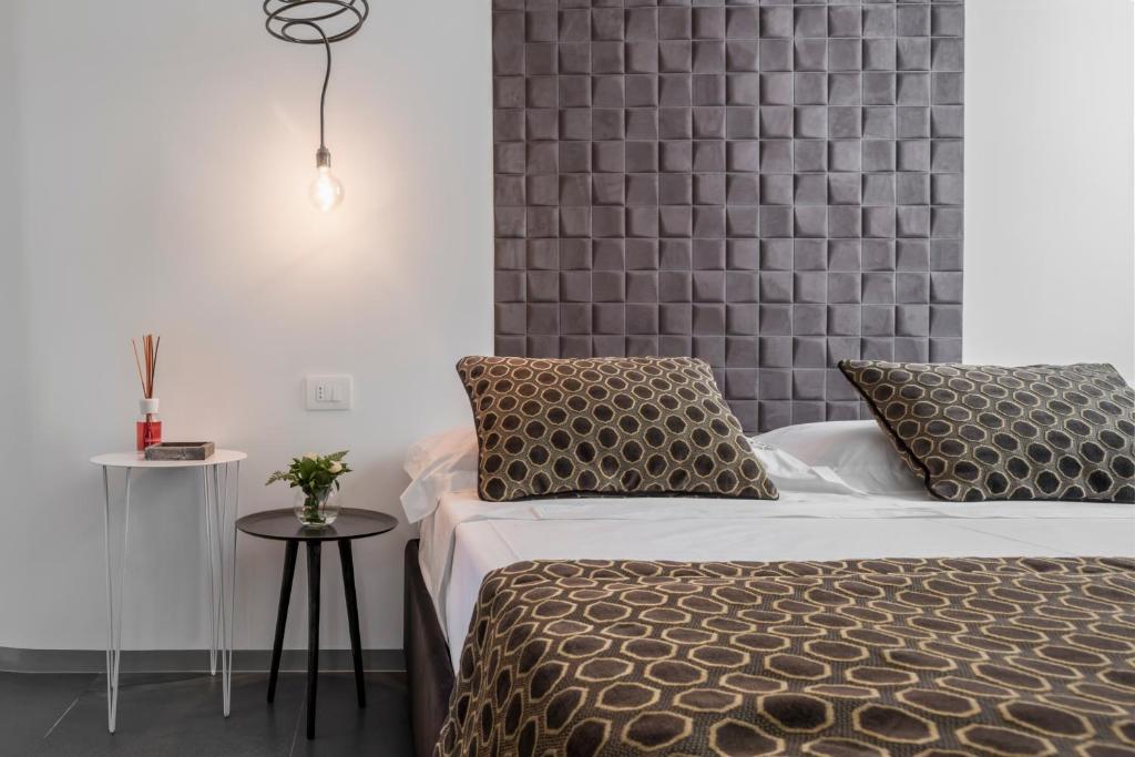 Postel nebo postele na pokoji v ubytování Slo Design House