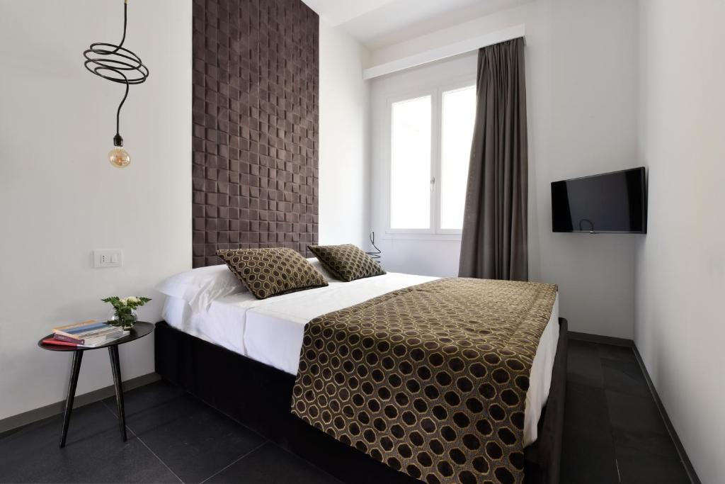 Postel nebo postele na pokoji v ubytování Slo Design House