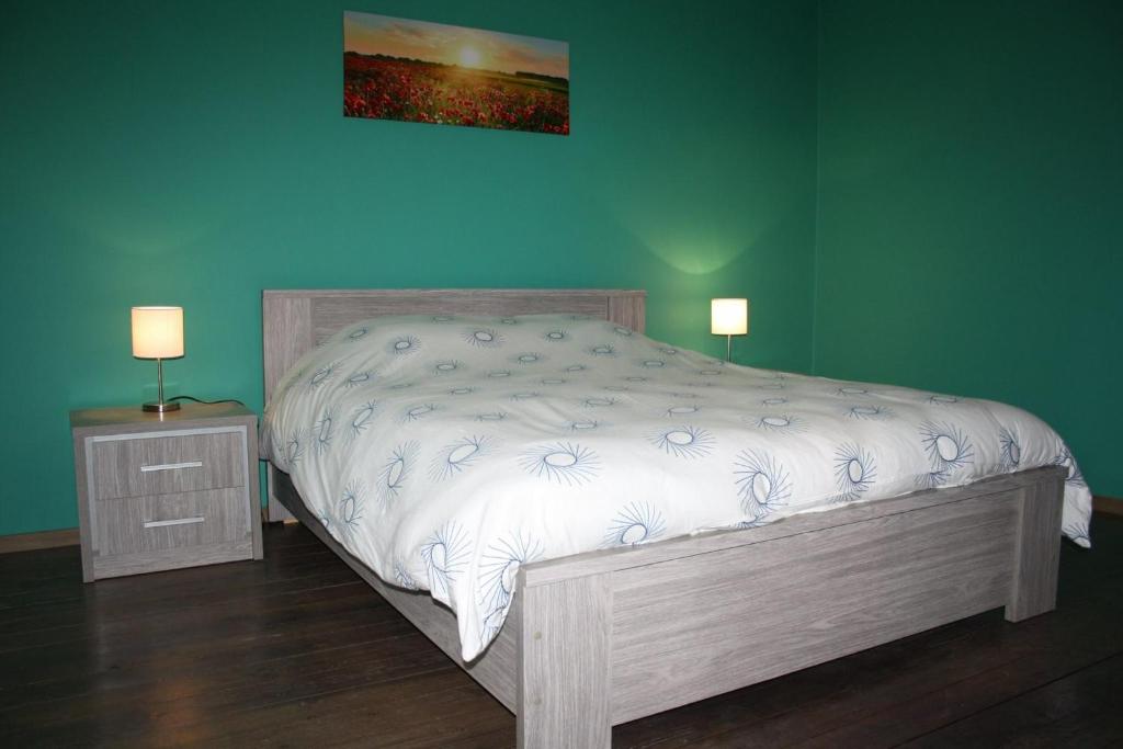 Postel nebo postele na pokoji v ubytování Gite Au Cortil