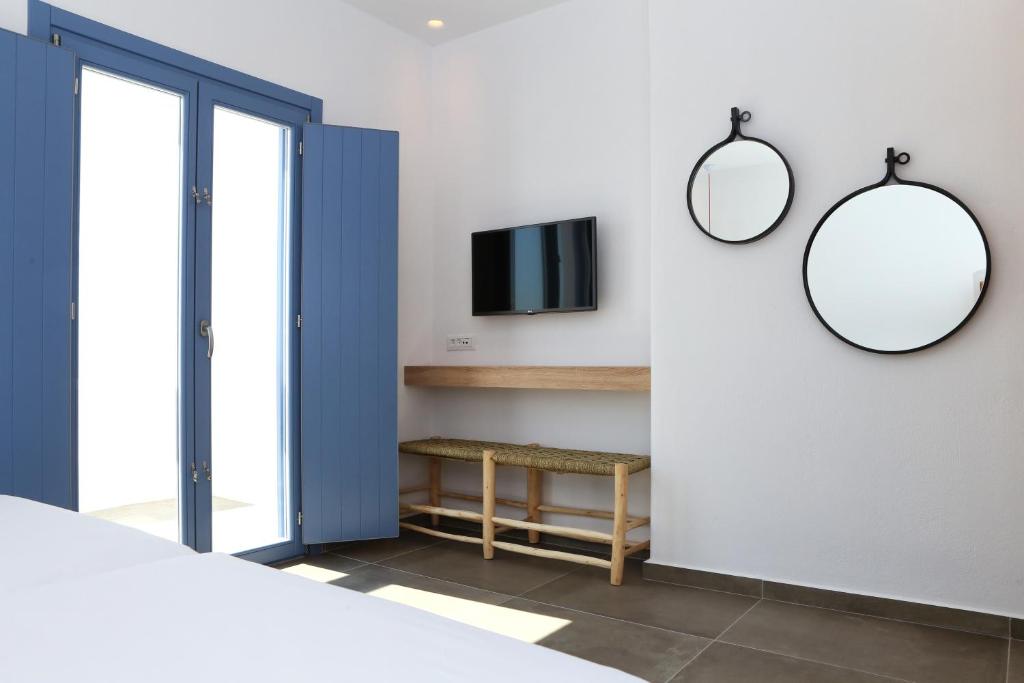 Postel nebo postele na pokoji v ubytování Jason Hotel