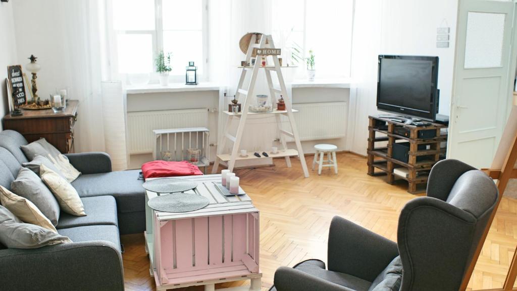 Televízia a/alebo spoločenská miestnosť v ubytovaní Old Town Heart