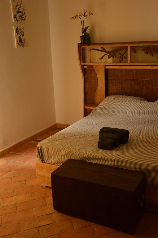 A bed or beds in a room at Agriturismo Riparossa