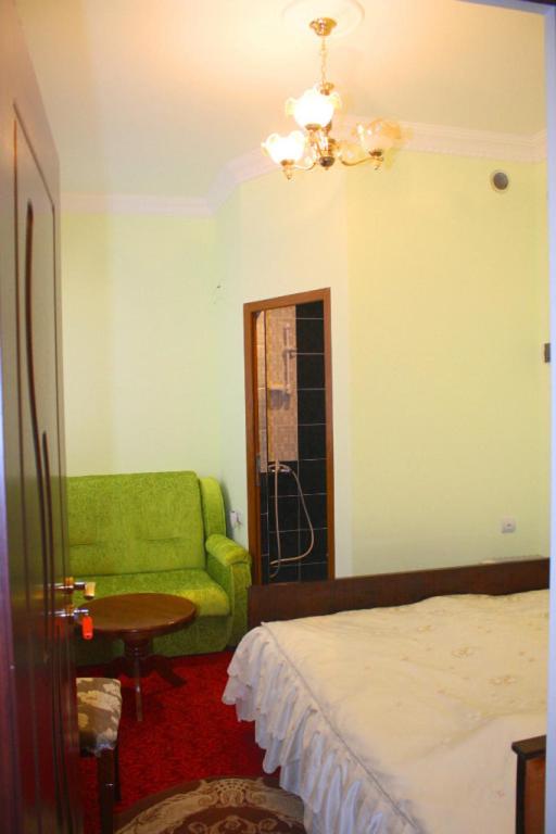 Postel nebo postele na pokoji v ubytování Hotel Noy