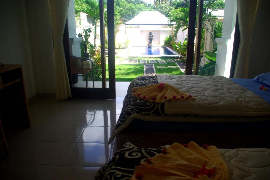 Postel nebo postele na pokoji v ubytování Gerke House