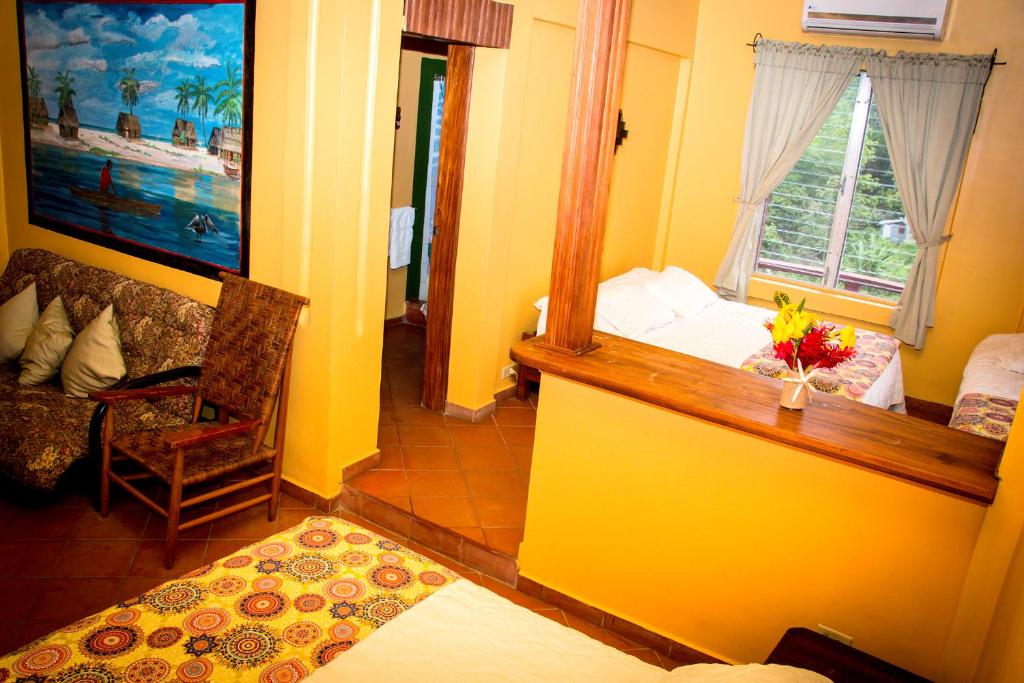 Postel nebo postele na pokoji v ubytování Hotel Maya Vista