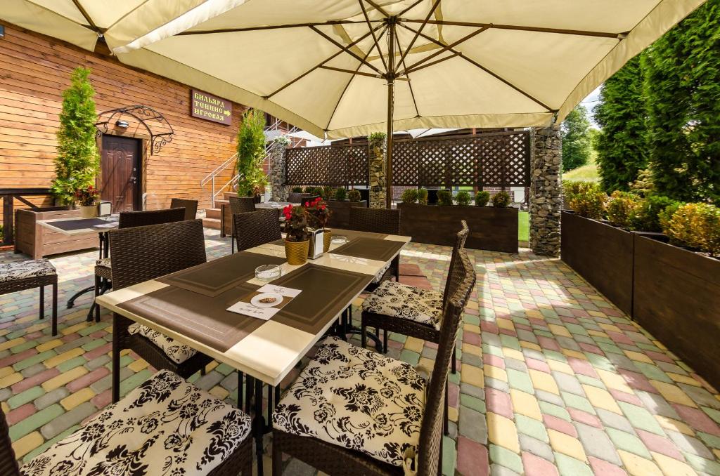 Restaurace v ubytování Апарт-отель 5 каминов