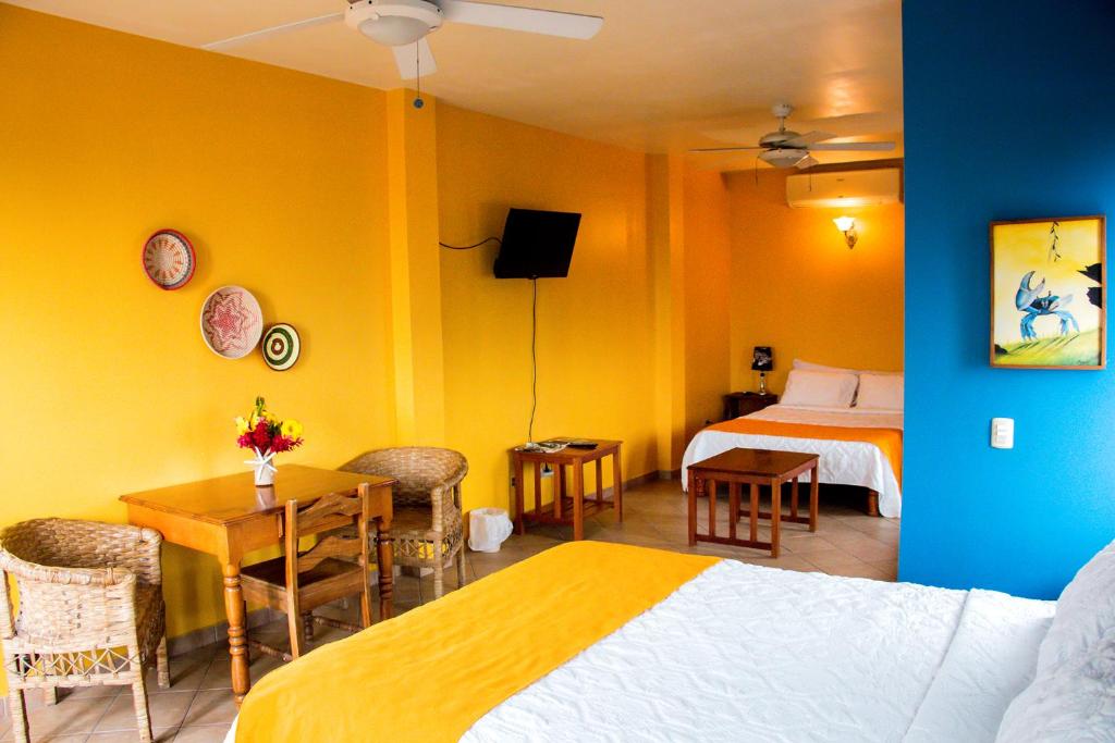 Кровать или кровати в номере Hotel Maya Vista
