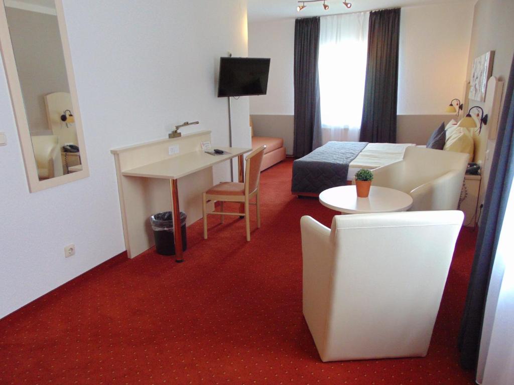TV a/nebo společenská místnost v ubytování Hotel Restaurant Molitor