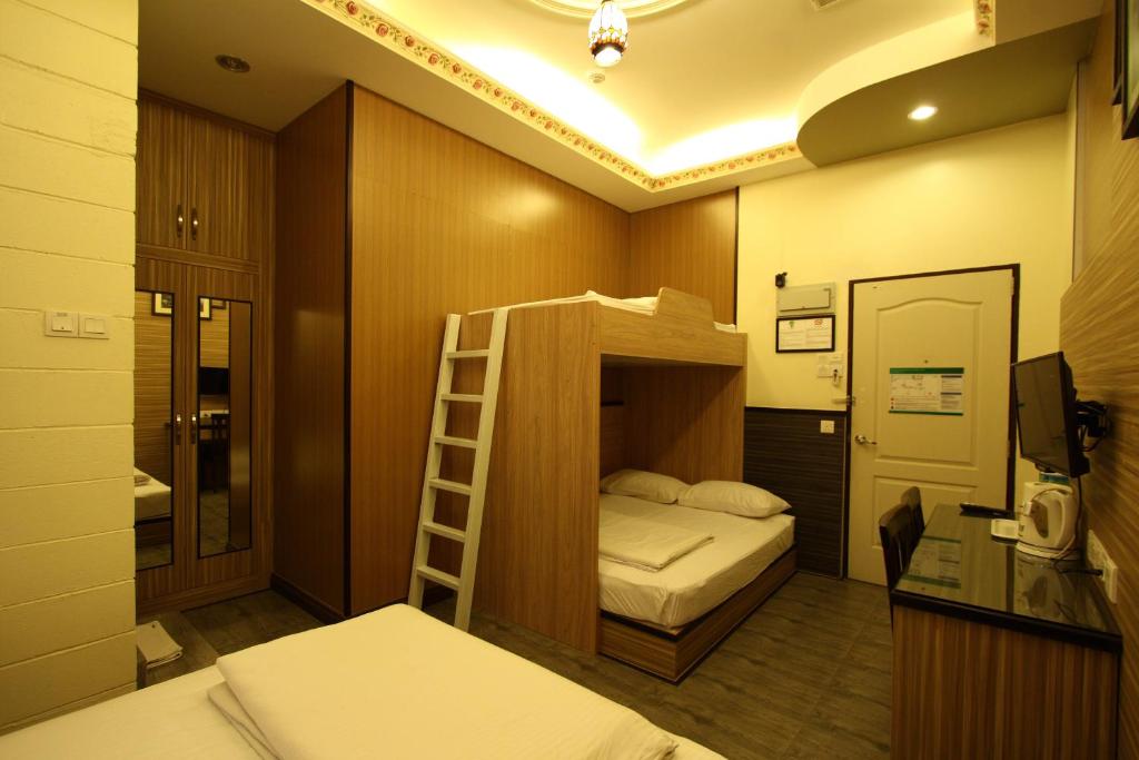 Postel nebo postele na pokoji v ubytování Shamrock Guest House II