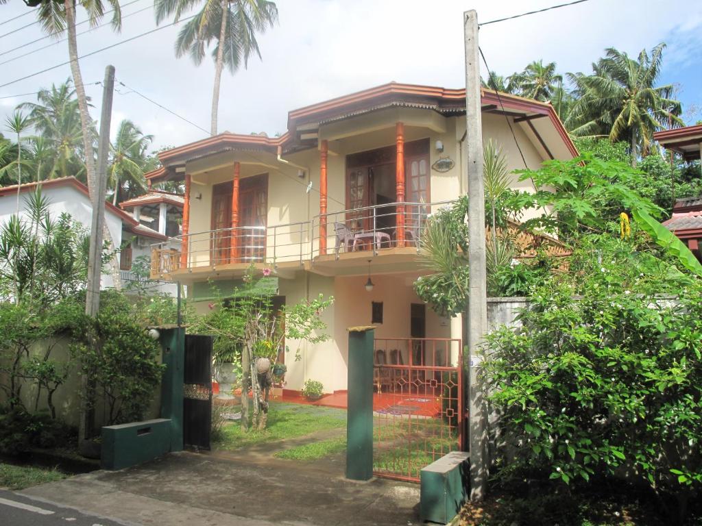 a house in the middle of a street at Diamond Villa in Bentota