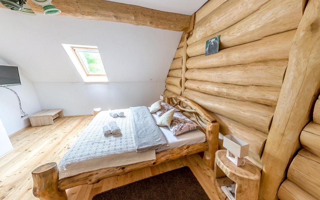 Postel nebo postele na pokoji v ubytování BeaR's LOG