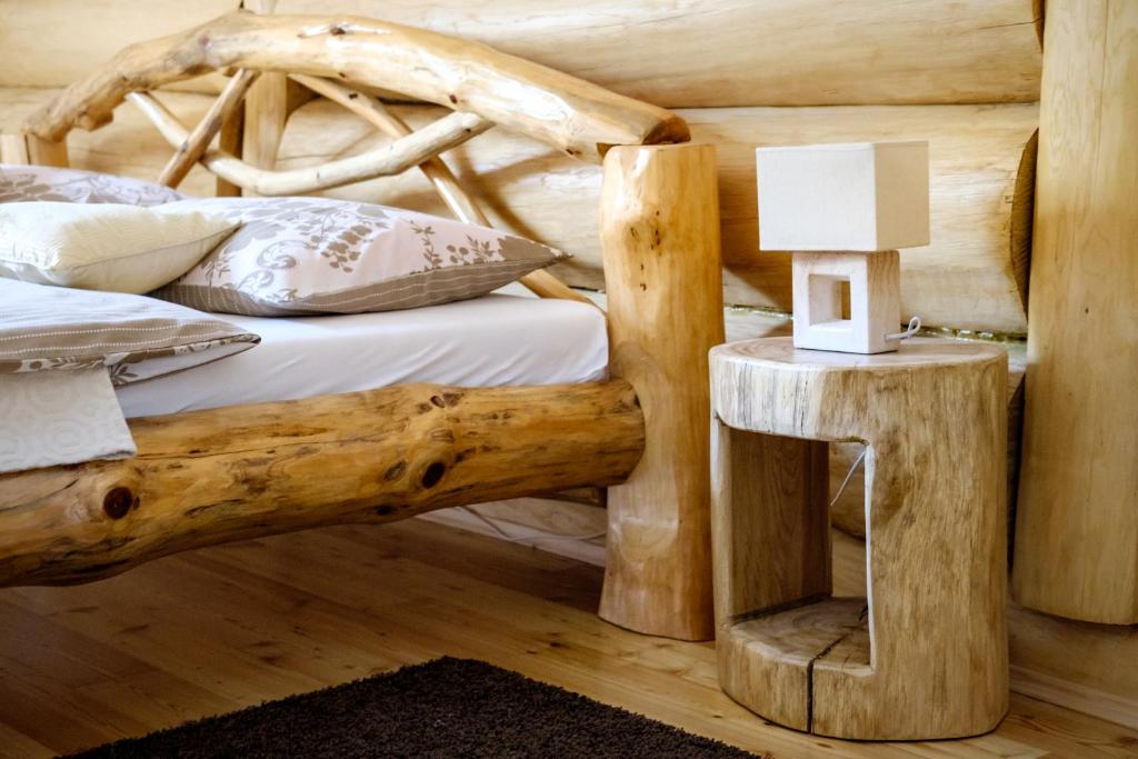 Postel nebo postele na pokoji v ubytování BeaR's LOG