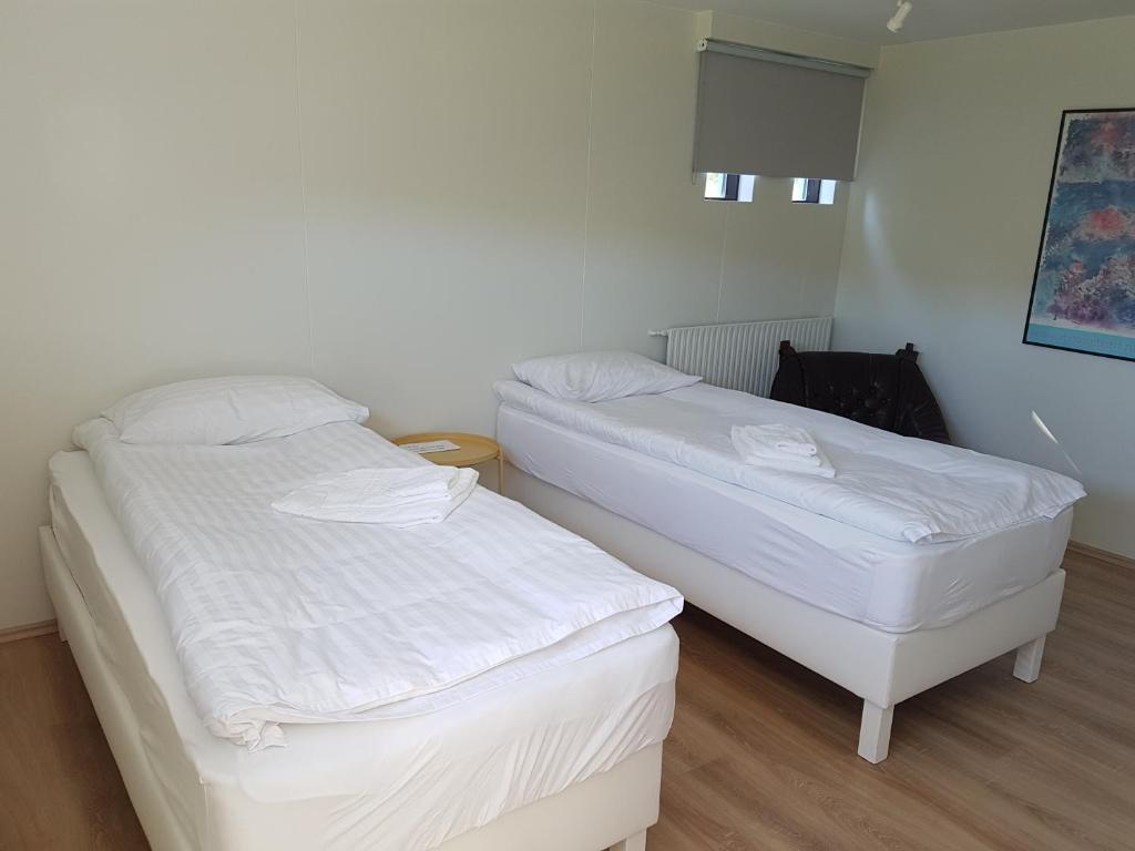 Postel nebo postele na pokoji v ubytování Fermata North