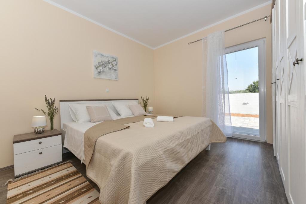 Posteľ alebo postele v izbe v ubytovaní Villa Rafajela - Private Pool