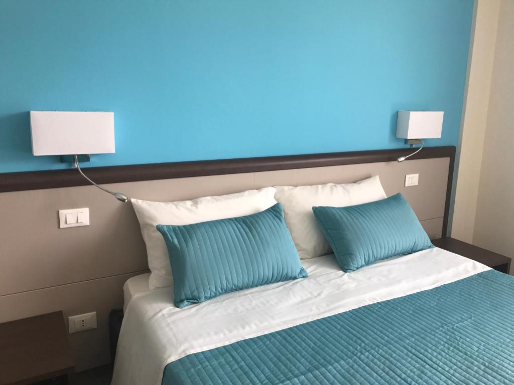 Postel nebo postele na pokoji v ubytování Sud Est Guest House