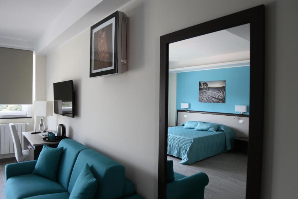 Postel nebo postele na pokoji v ubytování Sud Est Guest House