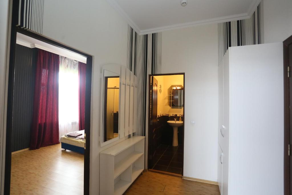 Postel nebo postele na pokoji v ubytování Praktik Hotel & Restaurant