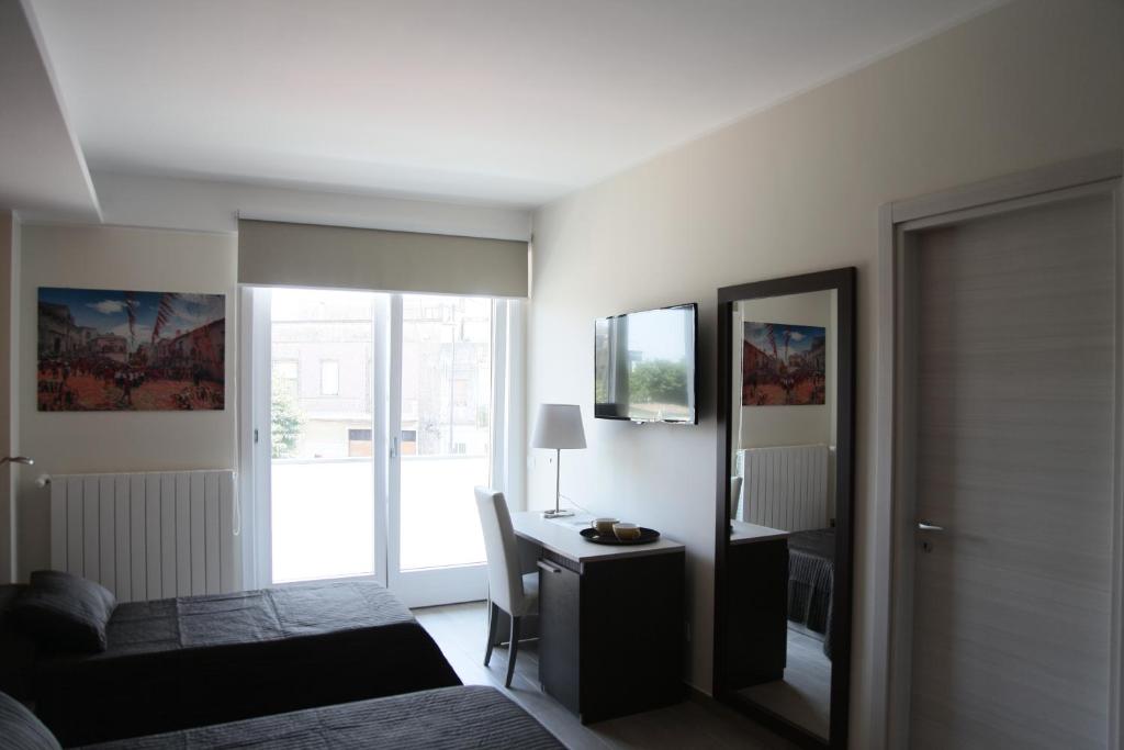 Posezení v ubytování Sud Est Guest House