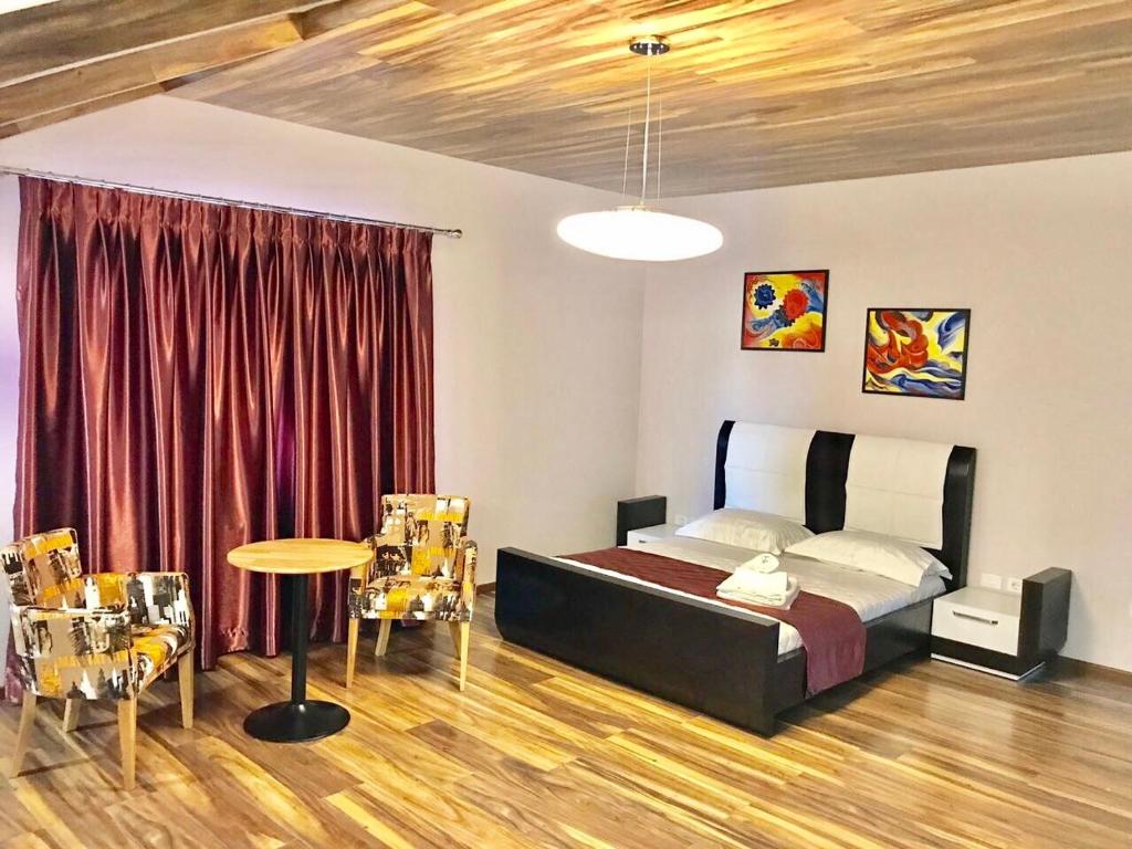 Postel nebo postele na pokoji v ubytování Diamond Beach Residence Hotel