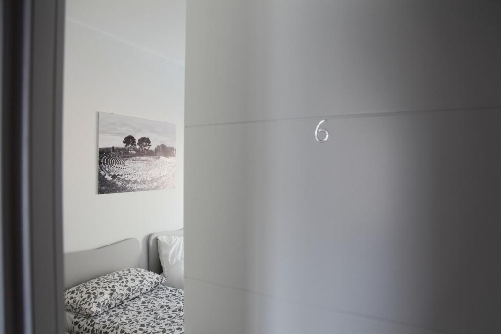 Postel nebo postele na pokoji v ubytování Sud Est Guest House