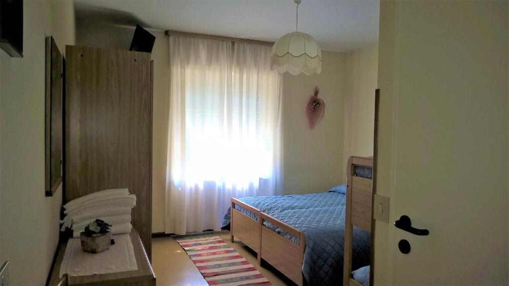 Postel nebo postele na pokoji v ubytování Hotel Zoldana