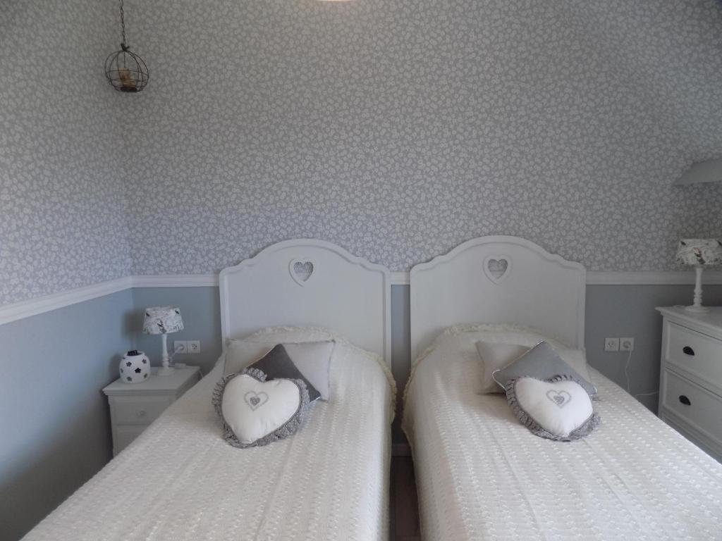 Postel nebo postele na pokoji v ubytování Le Cardinal B&B