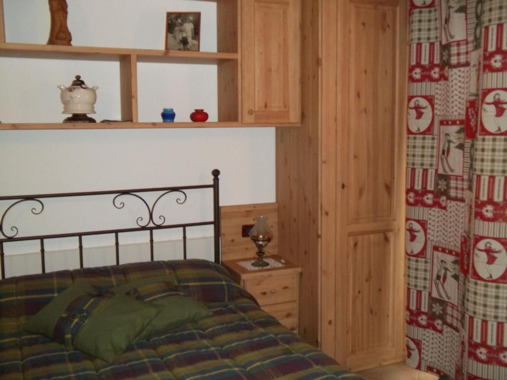 Postel nebo postele na pokoji v ubytování Affittacamere Chez Magan