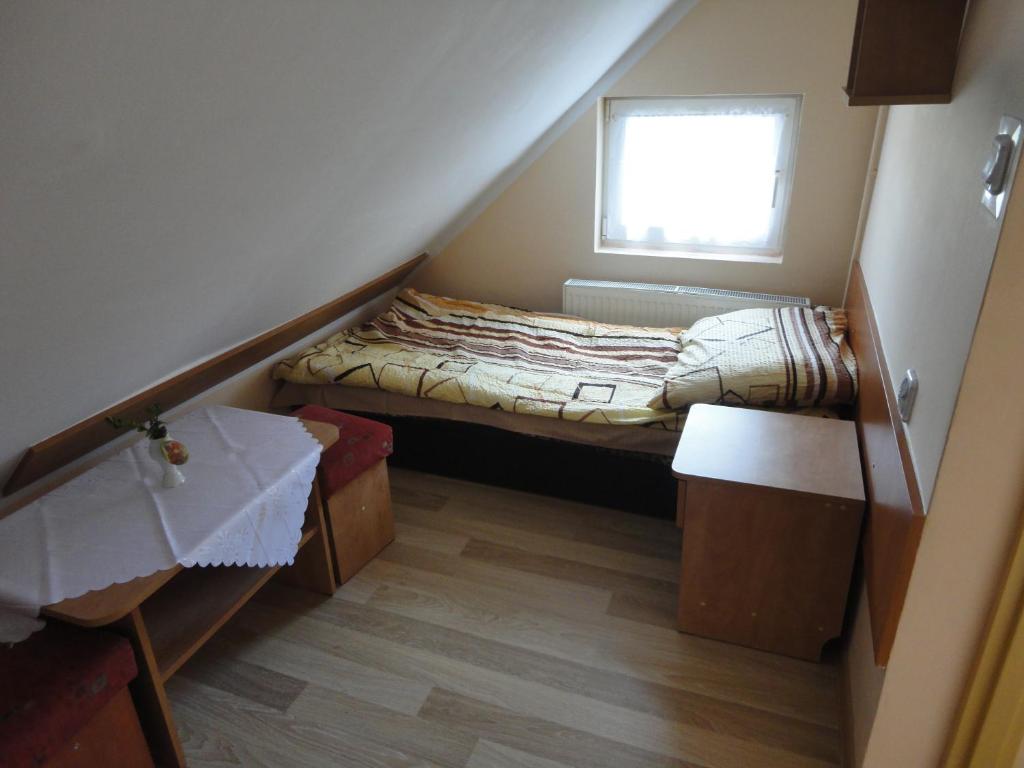 Postel nebo postele na pokoji v ubytování O.W.S. Strzecha