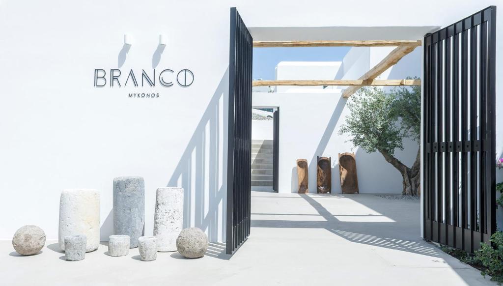 a gate to the entrance to the bivenoco museum at Branco Mykonos in Platis Gialos
