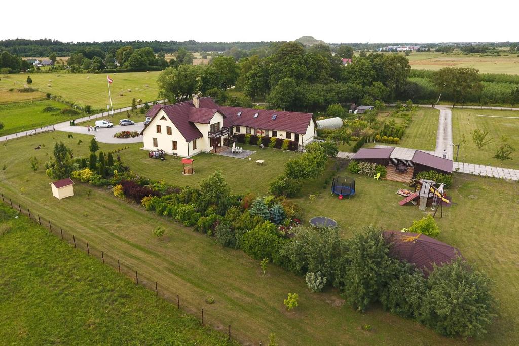 an aerial view of a house with a garden at Viesu nams Kāpsargi in Ventspils