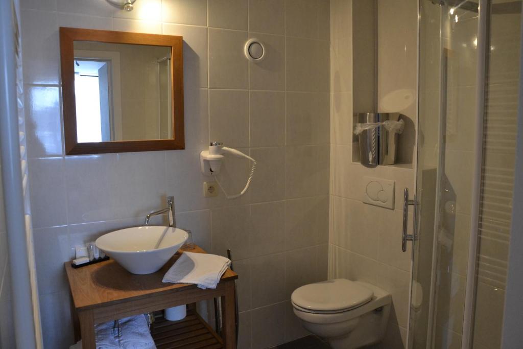 Koupelna v ubytování Auberge Le Temps des Saveurs