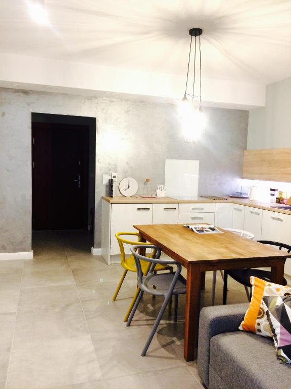 Kuchyňa alebo kuchynka v ubytovaní Piper Cytadela Apartament