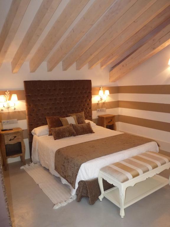 Postel nebo postele na pokoji v ubytování Los Calaos de Briones