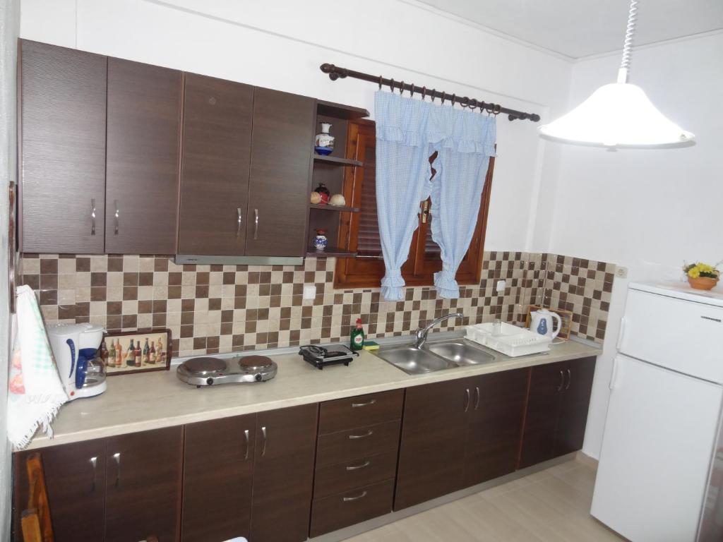 Kuchyň nebo kuchyňský kout v ubytování Germanis House