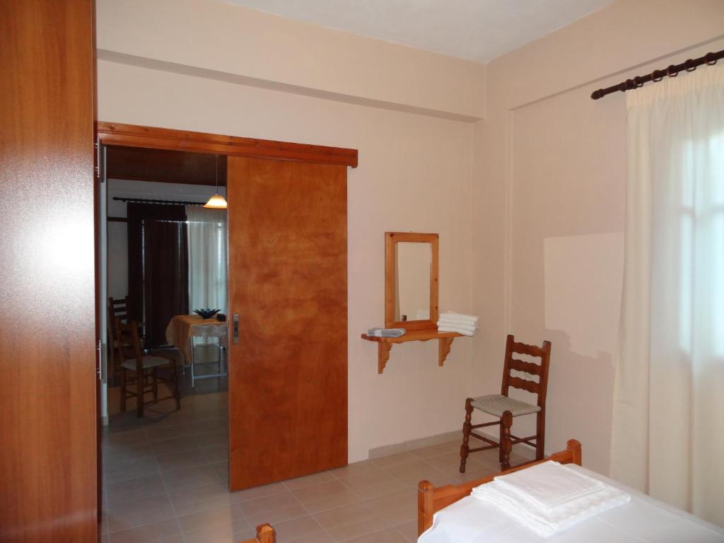 Postel nebo postele na pokoji v ubytování Germanis House