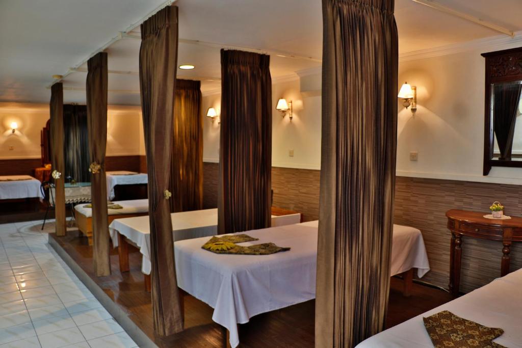 Postel nebo postele na pokoji v ubytování Jayakarta Hotel Jakarta