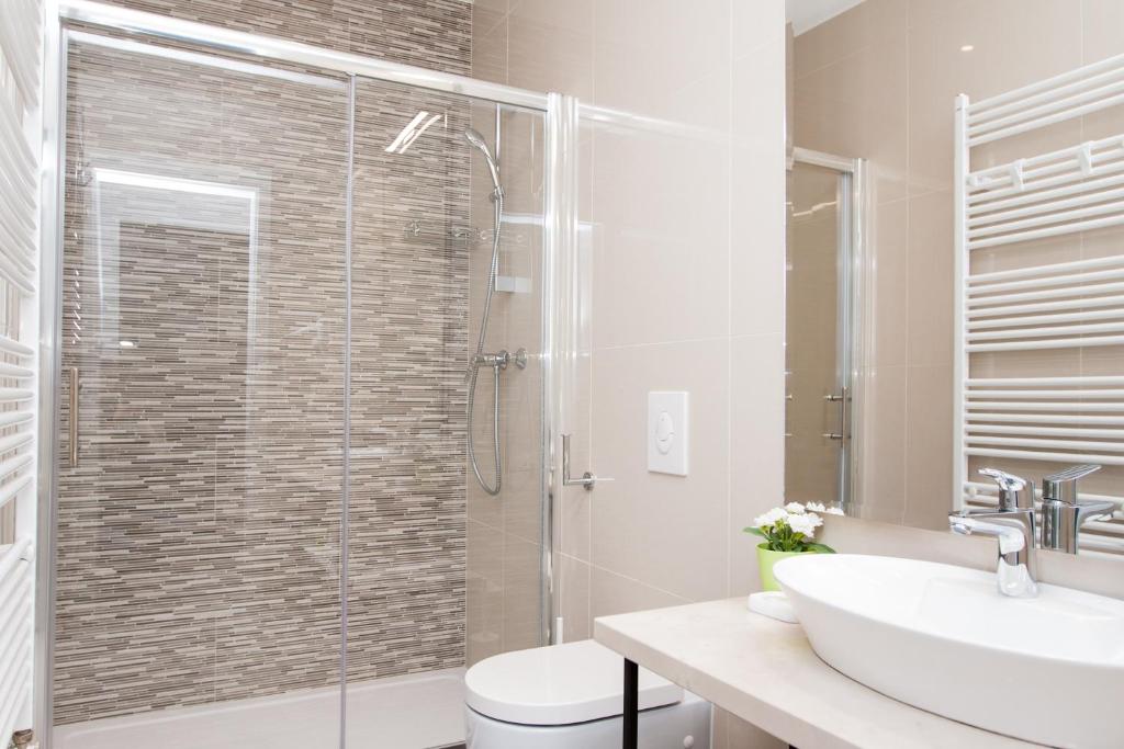 Koupelna v ubytování LOOX apartments Hatzova
