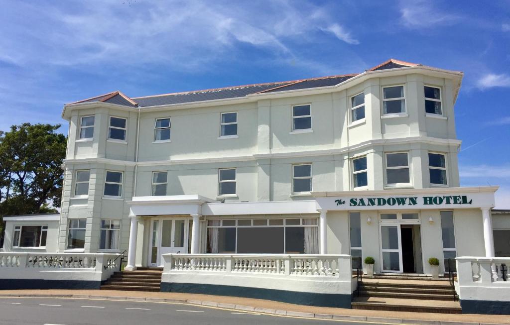a large white building with a sign on it at The Sandown - Seafront, Sandown, Isle of Wight - CAR FERRY TICKET from 109 Pounds in Sandown