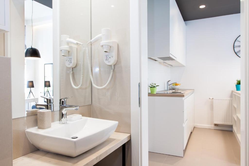 Koupelna v ubytování LOOX apartments Hatzova