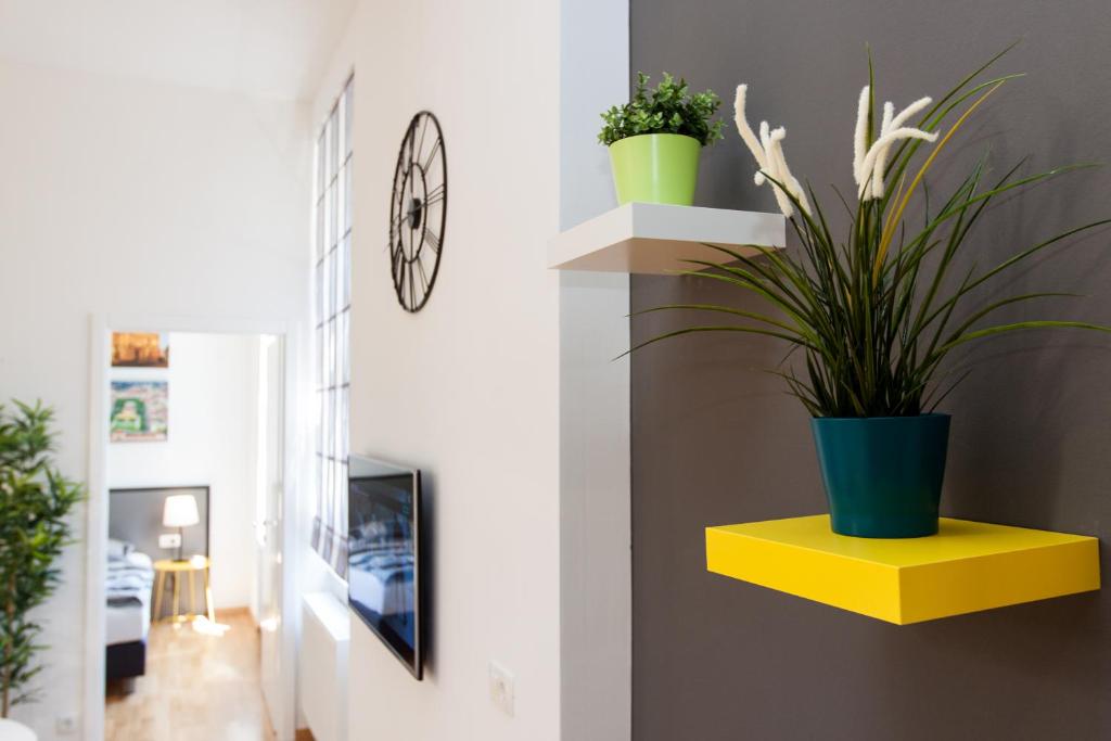 TV a/nebo společenská místnost v ubytování LOOX apartments Hatzova