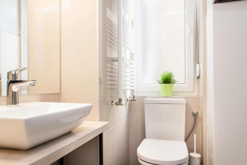 Koupelna v ubytování LOOX apartments Hatzova