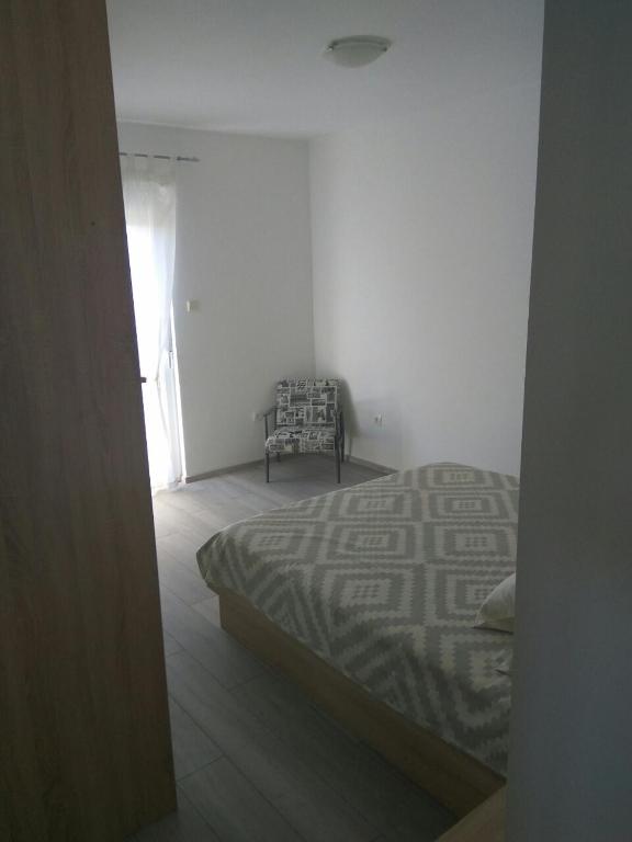 Postel nebo postele na pokoji v ubytování Apartment Belas