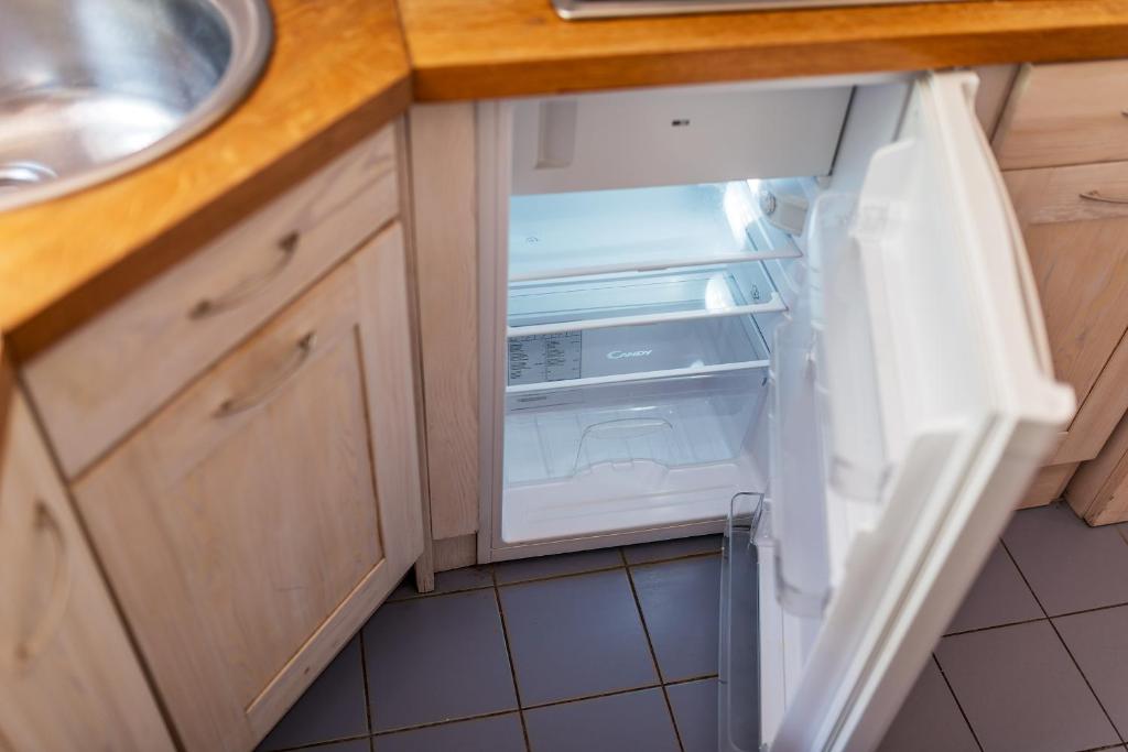 Kuchyňa alebo kuchynka v ubytovaní P&O Apartments Plac Krasińskich