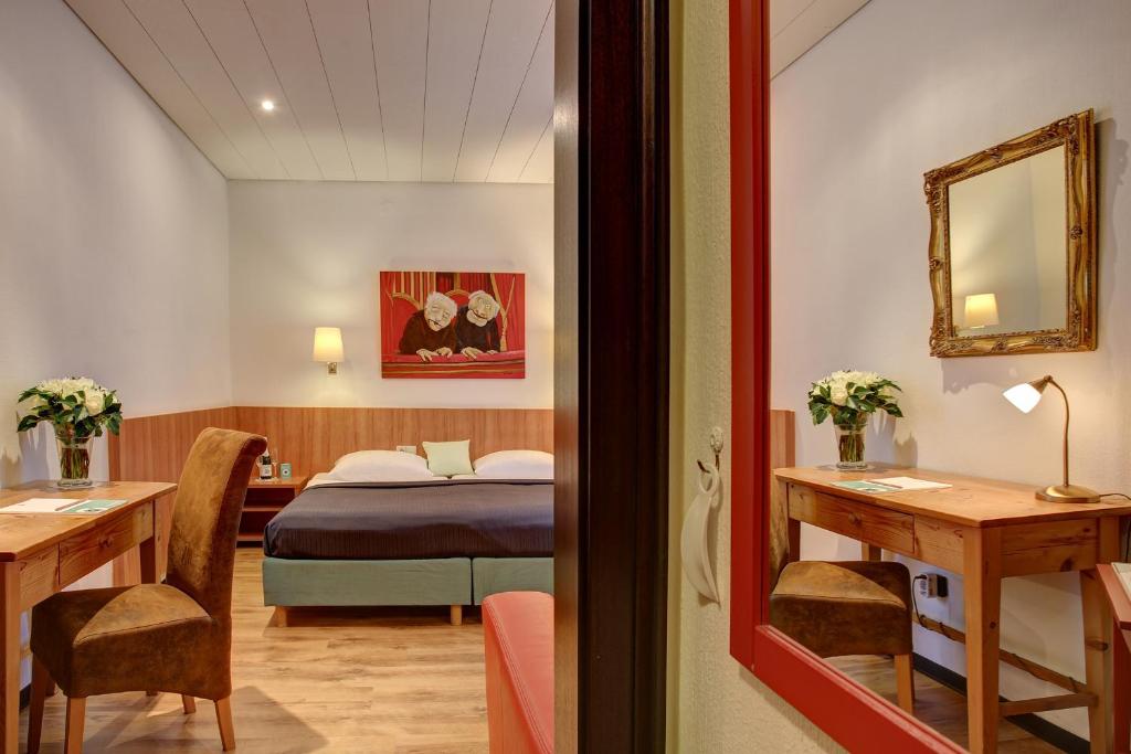 Postel nebo postele na pokoji v ubytování Trip Inn Hotel Blankenburg