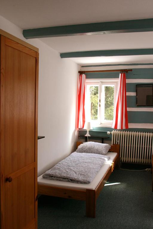 Postel nebo postele na pokoji v ubytování Jeleni chata Skladanka