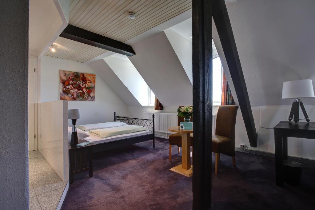 Postel nebo postele na pokoji v ubytování Trip Inn Hotel Blankenburg