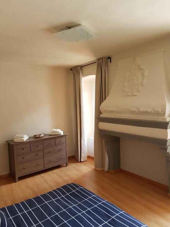 Łóżko lub łóżka w pokoju w obiekcie residenza la roggia