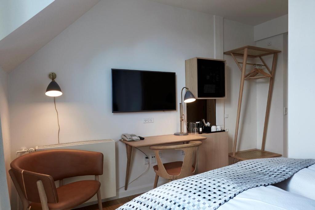 TV a/nebo společenská místnost v ubytování Copenhagen Strand